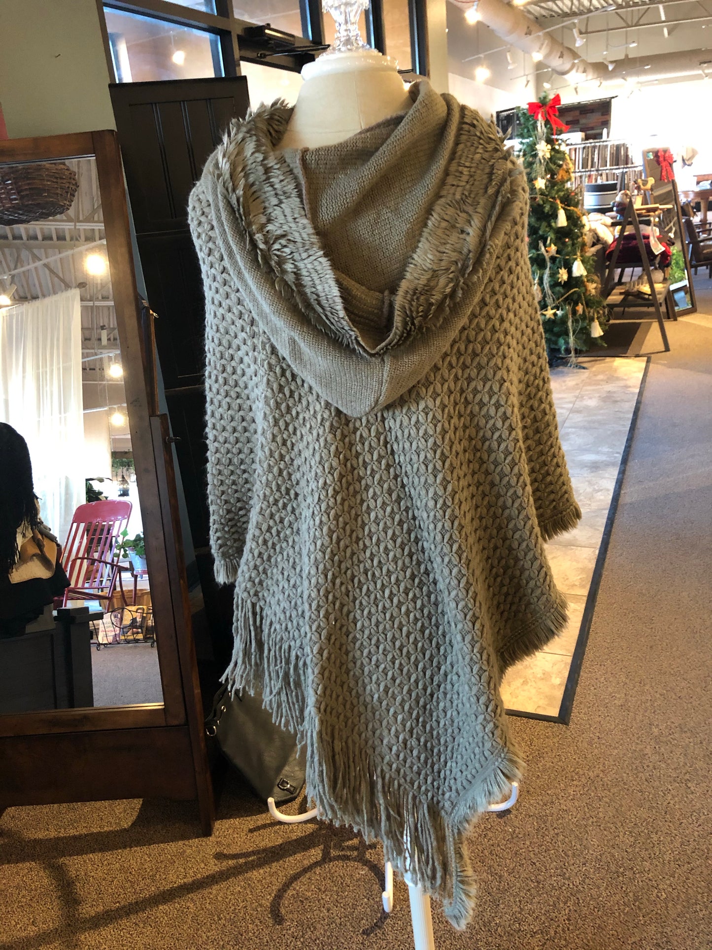 Green cable knit poncho