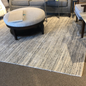 Gray and cream textured area rug