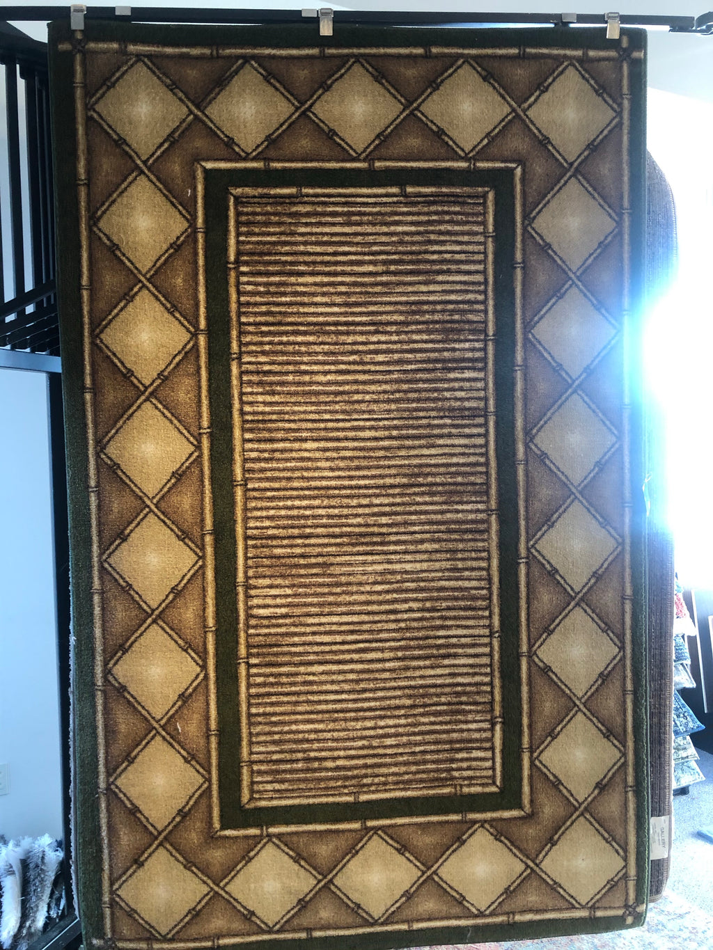 Green and brown bamboo rug
